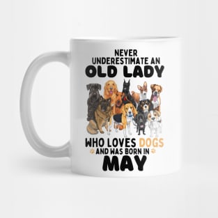 Never Underestimate An Old Lady Who Loves Dogs And Was may Mug